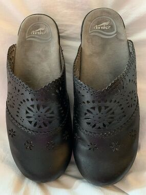 Dansko black leather 'Skylar' clogs with laser cutout design